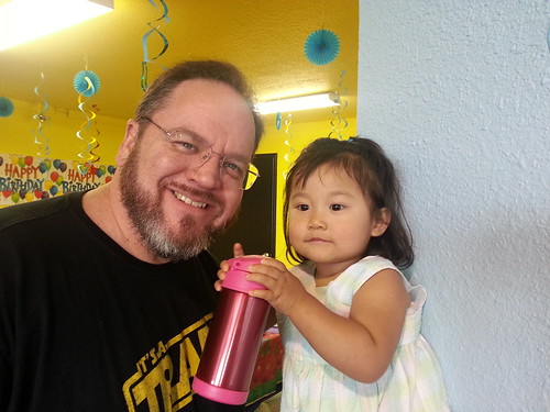 Mike and Dani watching the kids play games at the gym.