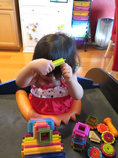 Dani playing with Brickle blocks