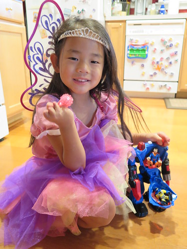 Amelie with some of her gifts after the party.