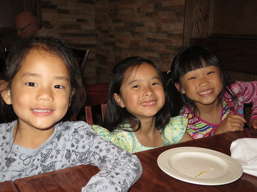 Amelie, Rieley and Nadia at dinner.
